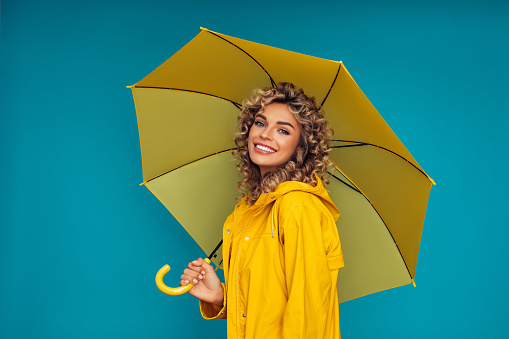 Girl with yellow umbrella