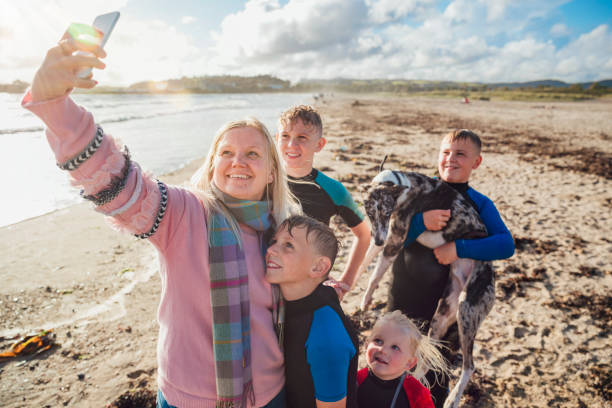 istock Family Selfie at the Beach 1287393438
