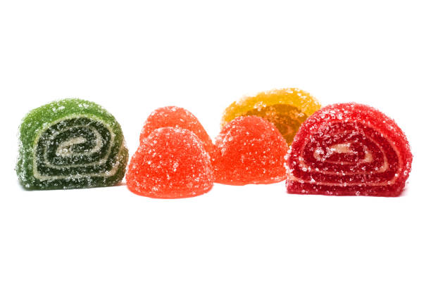 istock Multicolored candied fruit jelly, isolated on white background 1287393705