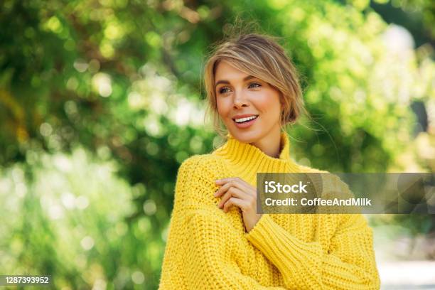 Smiling Young Woman Outdoors Stock Photo - Download Image Now - Springtime, Women, One Woman Only