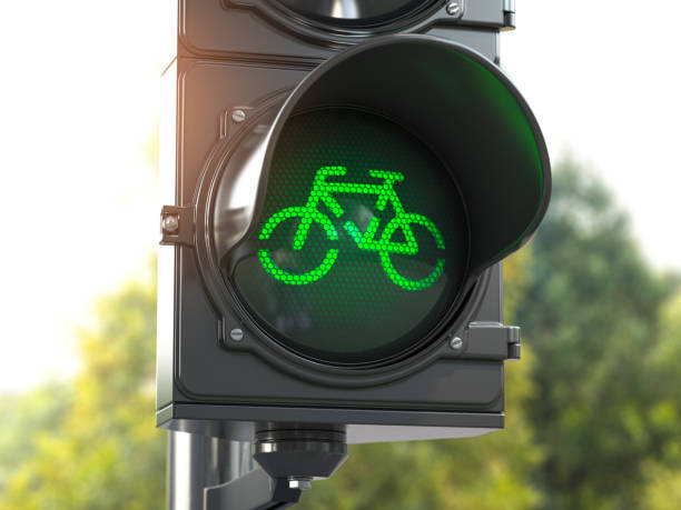 het groene signaal van de fiets op verkeerslicht. gratis fietsweg of zone voor fietsen.  fiets vriendelijk politiek concept. duurzaam transport. - voetgangersstoplicht stockfoto's en -beelden