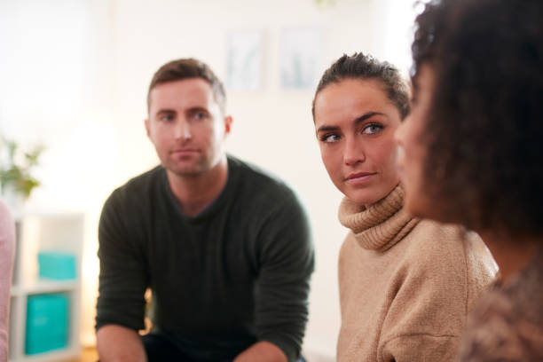 istock People Attending Support Group Meeting For Mental Health Or Dependency Issues In Community Space 1287394906