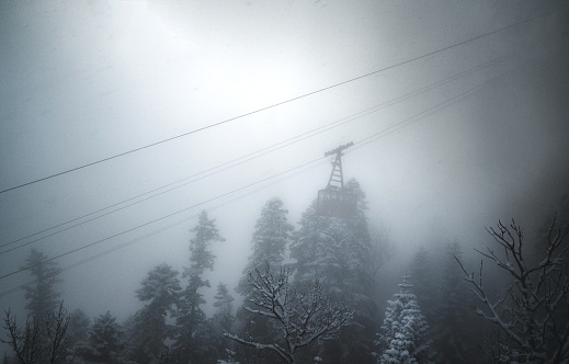Ski lift in fog