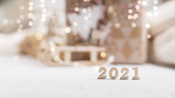 istock Christmas background with 2021 wooden text 1287397585