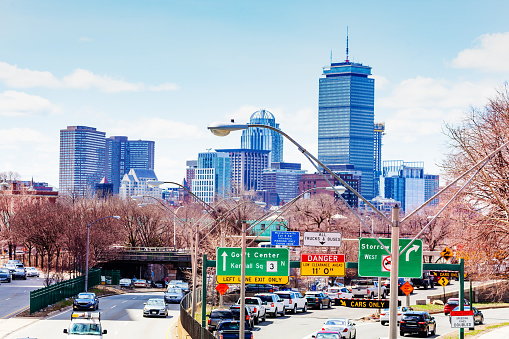 Storrow Drive Boston with cars and traffic over city downtown, MA, USA