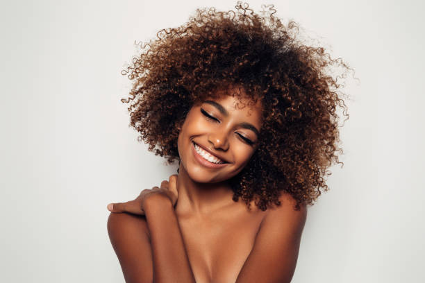 istock Beautiful afro woman with perfect make-up 1287400143