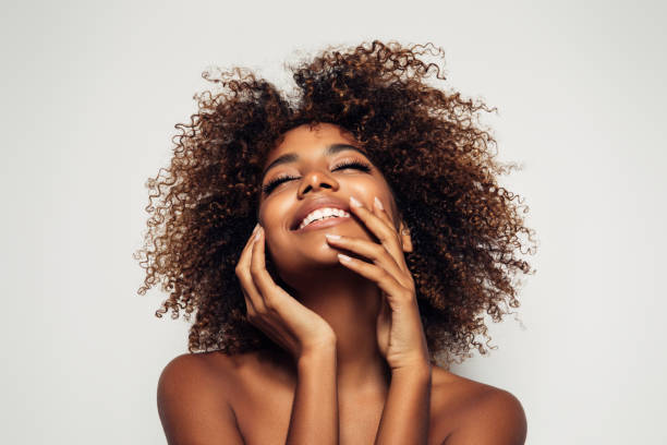 istock Beautiful afro woman with perfect make-up 1287400240