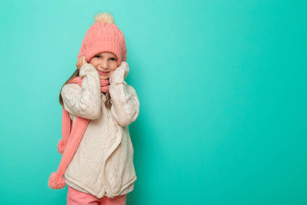 istock Little girl wearing warm winter clothes 1287402321