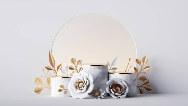 istock 3d render, abstract background with empty marble pedestals decorated with gold and white paper flowers. Showcase with blank podium and floral arrangement, commercial product display mockup. 1287403693