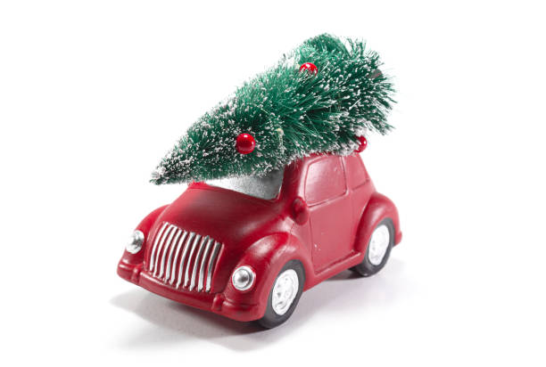 istock Porcelain car with a Christmas tree on top 1287404709