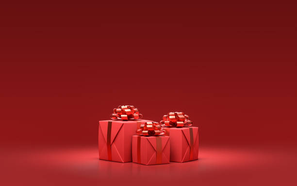 istock group of red gift boxes for christmas on the ground in solid monochrome red color room, 3d rendering 1287408155