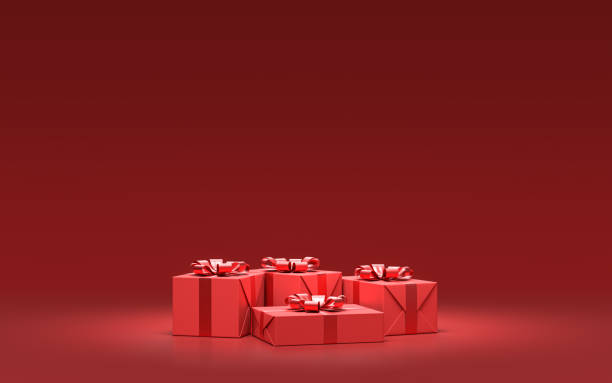 istock group of red gift boxes for christmas on the ground in solid monochrome red color room, 3d rendering 1287408413