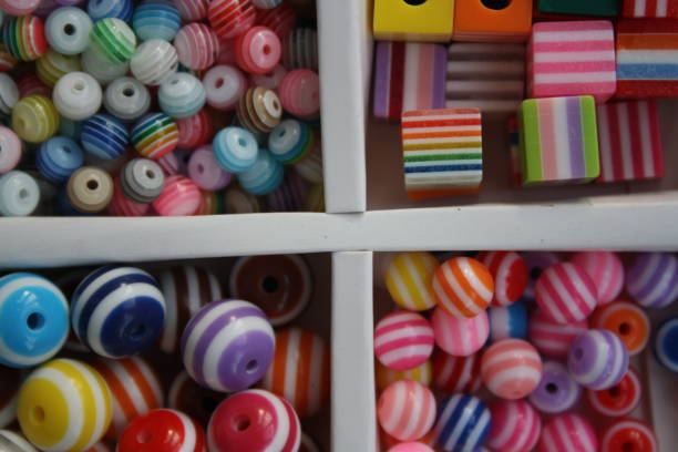 istock Beads in a box of different colors. 1287413140