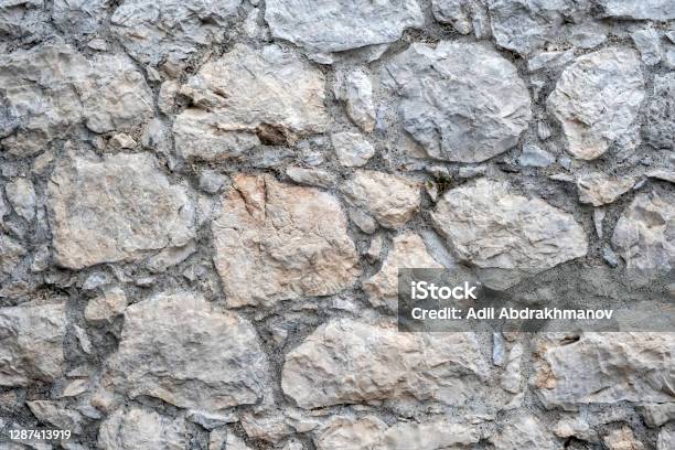 Ancient Rocks Background Ancient Rock Wall Texture Background Stock Photo - Download Image Now ...