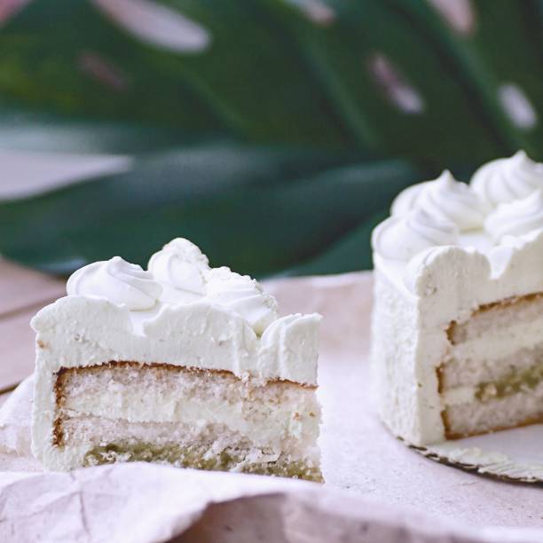 istock Peace of layered souffle dessert on blurred background. Toned morning light. 1287415070