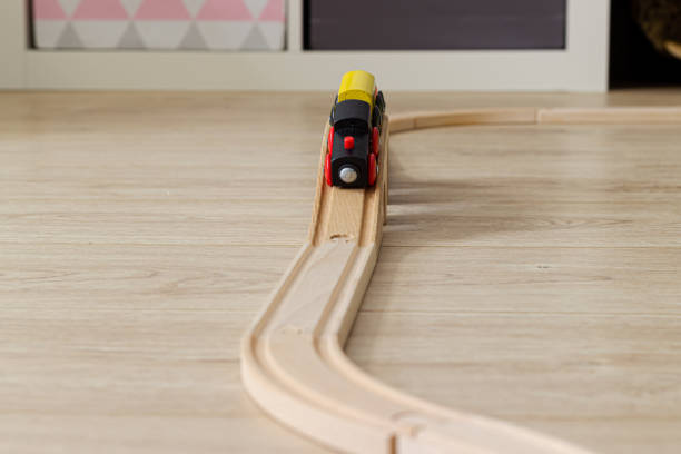 istock Toy train over a wooden bridge 1287415238