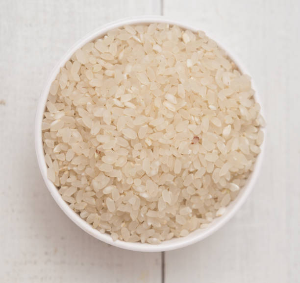 istock Rice on wooden 1287418878