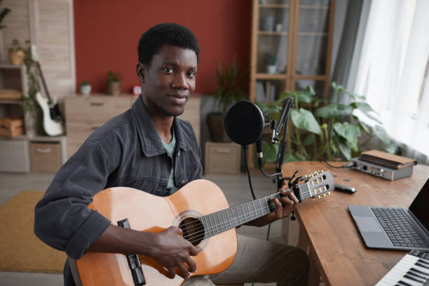 istock African-American Man Playing Guitar 1287419211