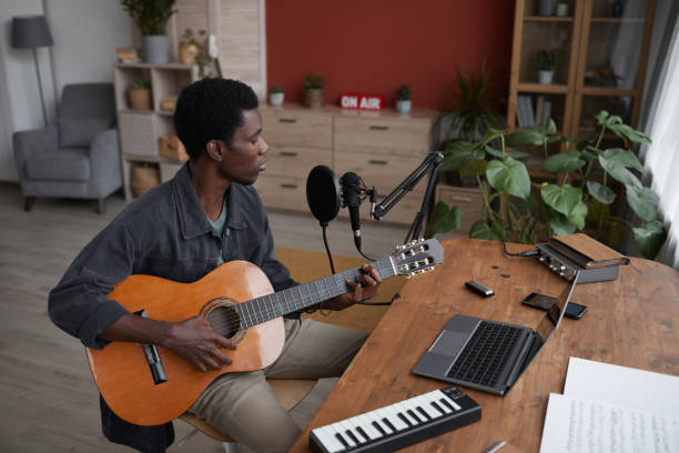 istock Young African-American Musician at Home 1287419220