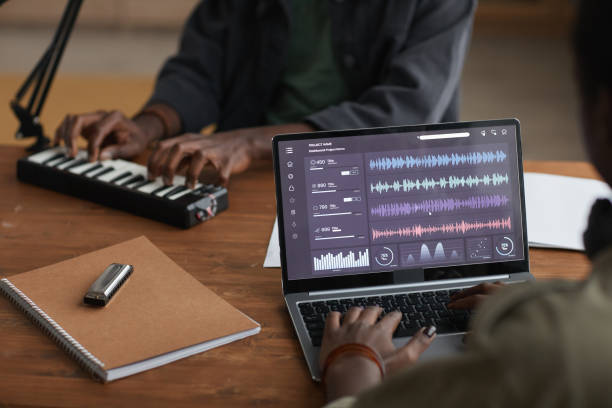 istock African-American Man Making Music via Laptop 1287419281