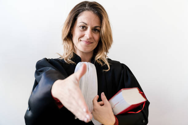 istock Justice, lawyer reaches out with a smile 1287419811