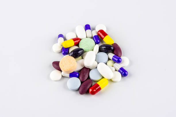 istock Group of pills, capsules and other coloful medications over white background 1287419904