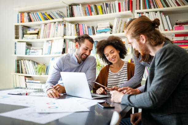 istock Collaboration and analysis by business people working in office 1287422627