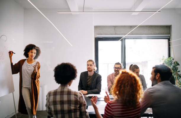 istock Collaboration and analysis by business people working in office 1287423117