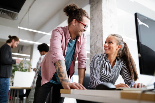 istock Group of business people collaborating on project in office 1287424000