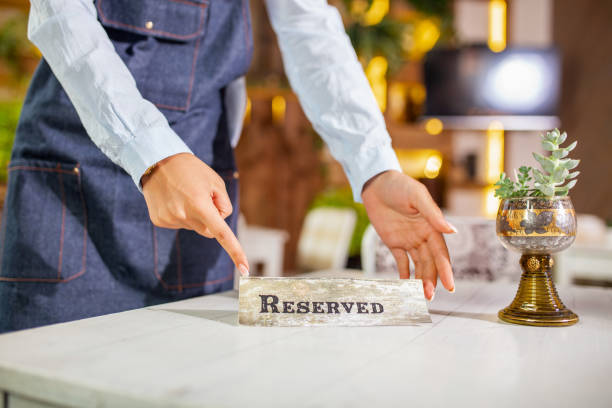 istock Elegant Restaurant Table Setting Service for Reception with Reserved Card. Restaurant reserved table sign 1287425684