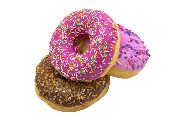 pink and brown doughnut, chocolate and berry doughnut, strawberry and raspberry doughnuts, walnut donut on a white background stock photo