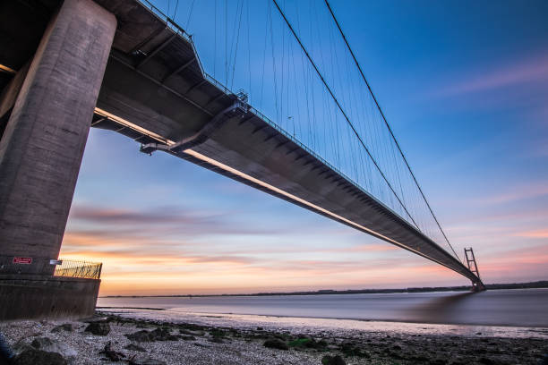 istock Humber Bridge from below with long exposure showing cloud movement, Hessle, Hull, England, Britain 1287426755