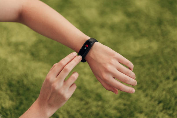 istock Smart watch on the hand. Measuring heart rate 1287426913
