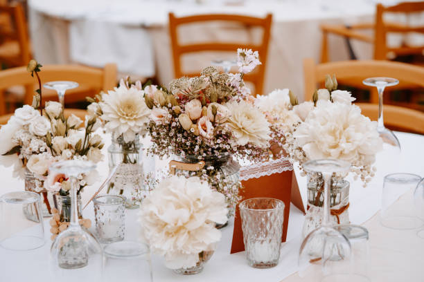 istock Bright Boho Wedding Table Decoration with wood and flowers in Majorca 1287428030