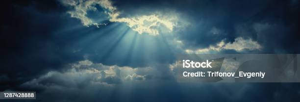 Panoramic View Of Clouds And Sun With Beautiful Rays Against The Sky Stock Photo - Download Image Now