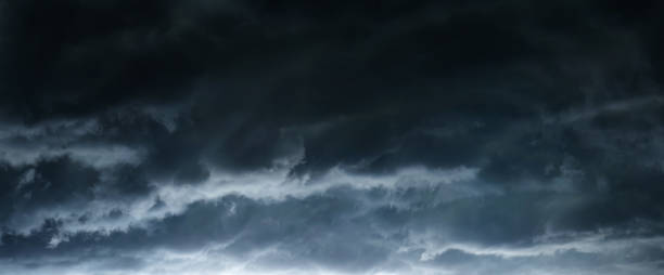 istock The typhoon, tornado in a stormy dark sky with black clouds and a strong wind. 1287429675