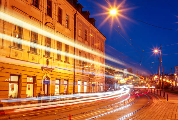 istock old Polish street with a passing tram 1287430817