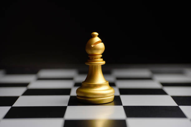 istock Chess gilded piece elephant on the board 1287431929