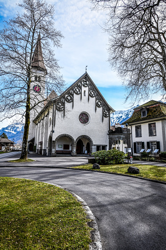 Front View Of Lutheran Church And Clocktower In Interlaken, Switzerland
