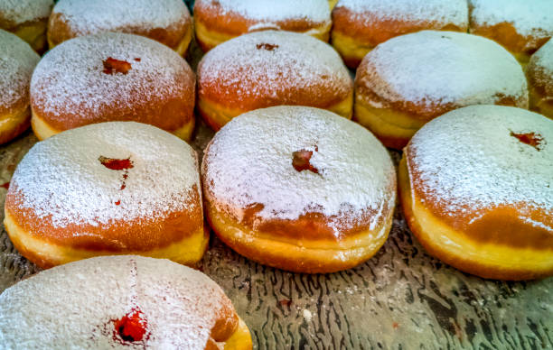 istock Festive sweet donuts at market place 1287433886