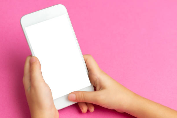 istock Little Girl Using Mobile Phone 1287433890