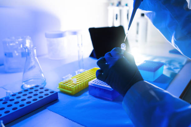 istock Researcher at work in DNA laboratory: coronavirus test for Covid 1287433970