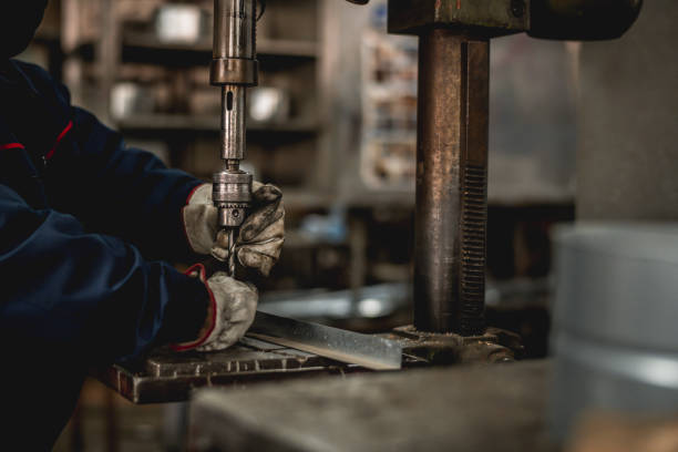 istock Close up off man in factory workshop working 1287434173