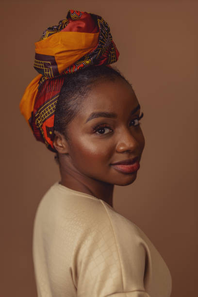 istock Beautiful Young african woman wearing a headpiece 1287434310