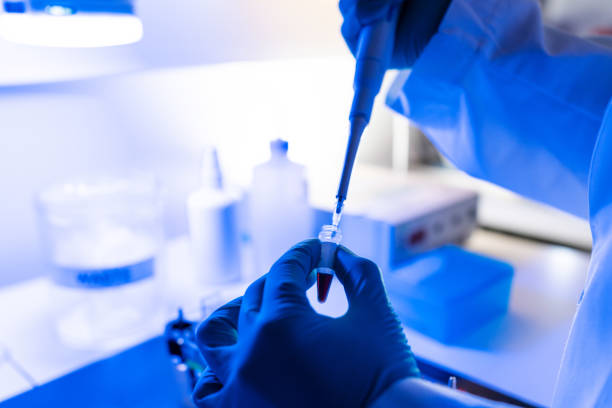 istock Researcher at work in DNA laboratory: coronavirus test for Covid 1287434924
