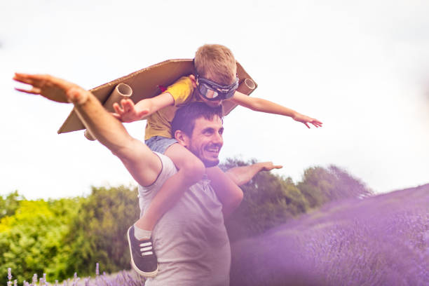 istock Father and son enjoying on lavender field 1287435284