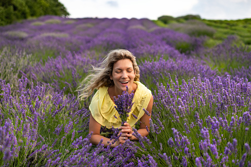 Woman enjoying on lavender field.