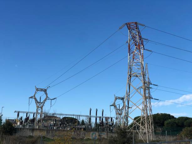 istock Electricity transmission towers pylons 1287436878