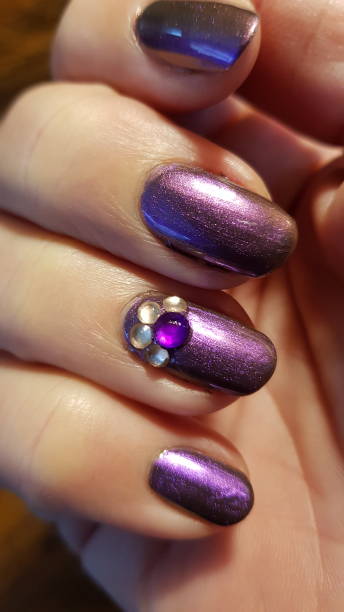 istock Polished nails with nailart 1287437139