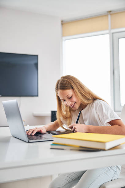 istock Smiling beautiful girl involved in digital art 1287439217